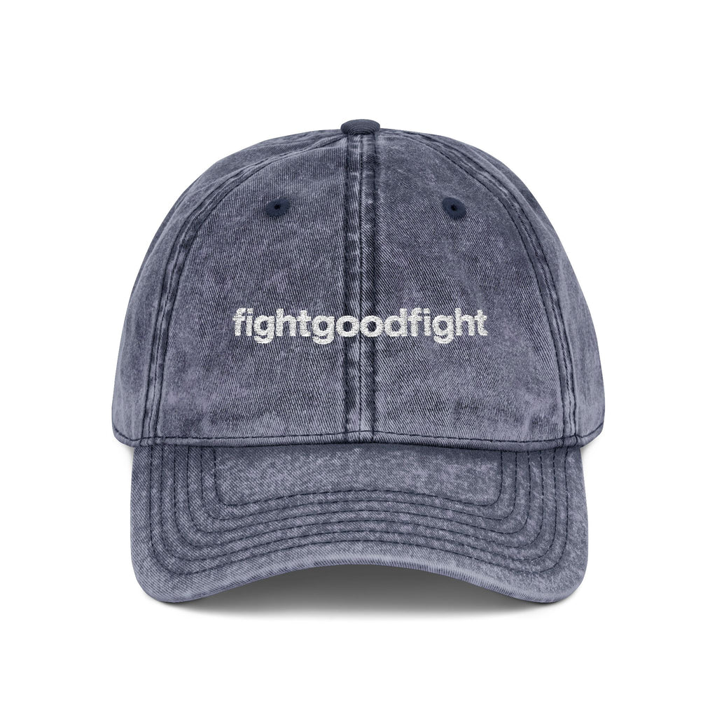 Blue cap with 'SINGH IS KING' text on a white background