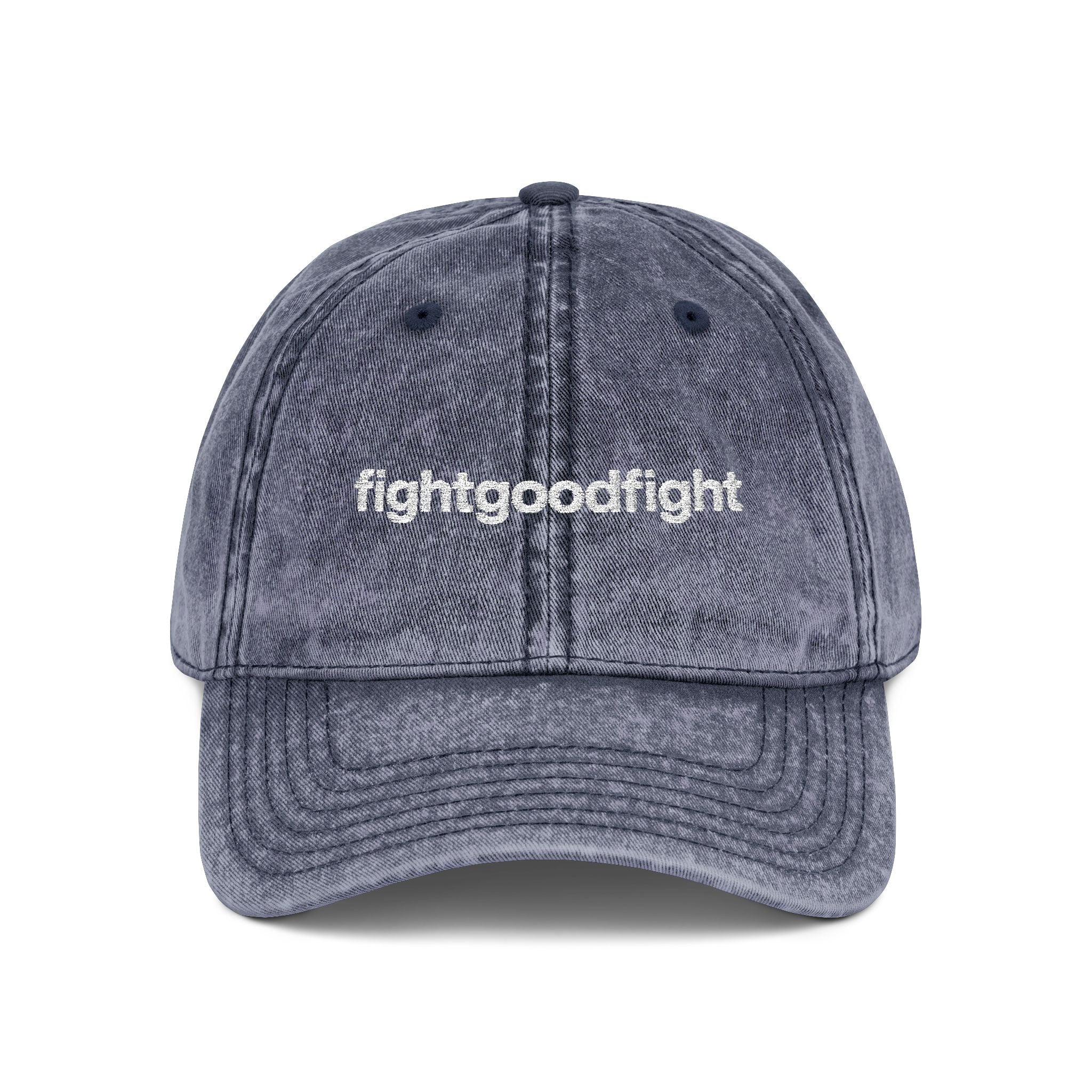 Blue cap with 'SINGH IS KING' text on a white background